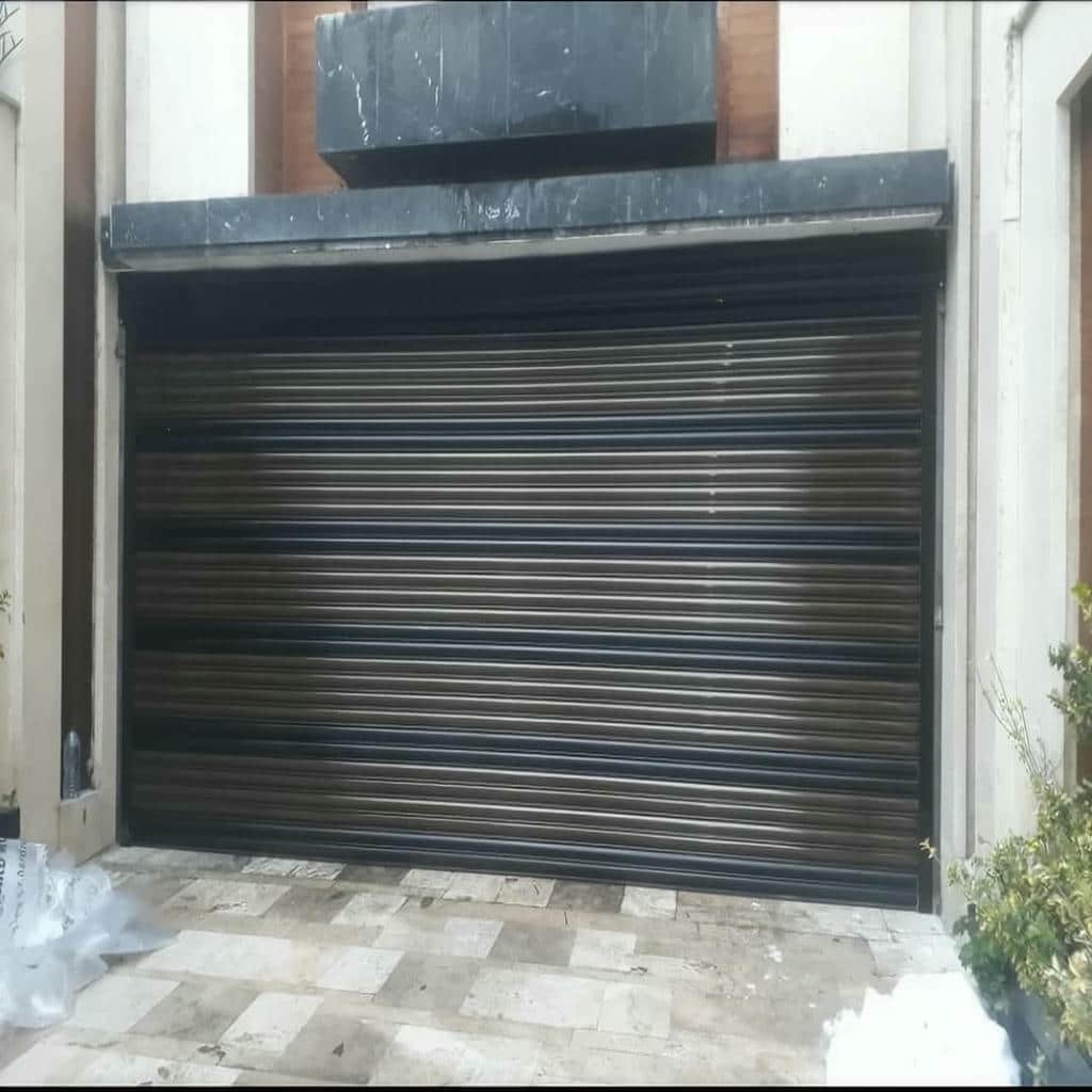 نصب کرکره برقی ویلا موتور ساید در کیش