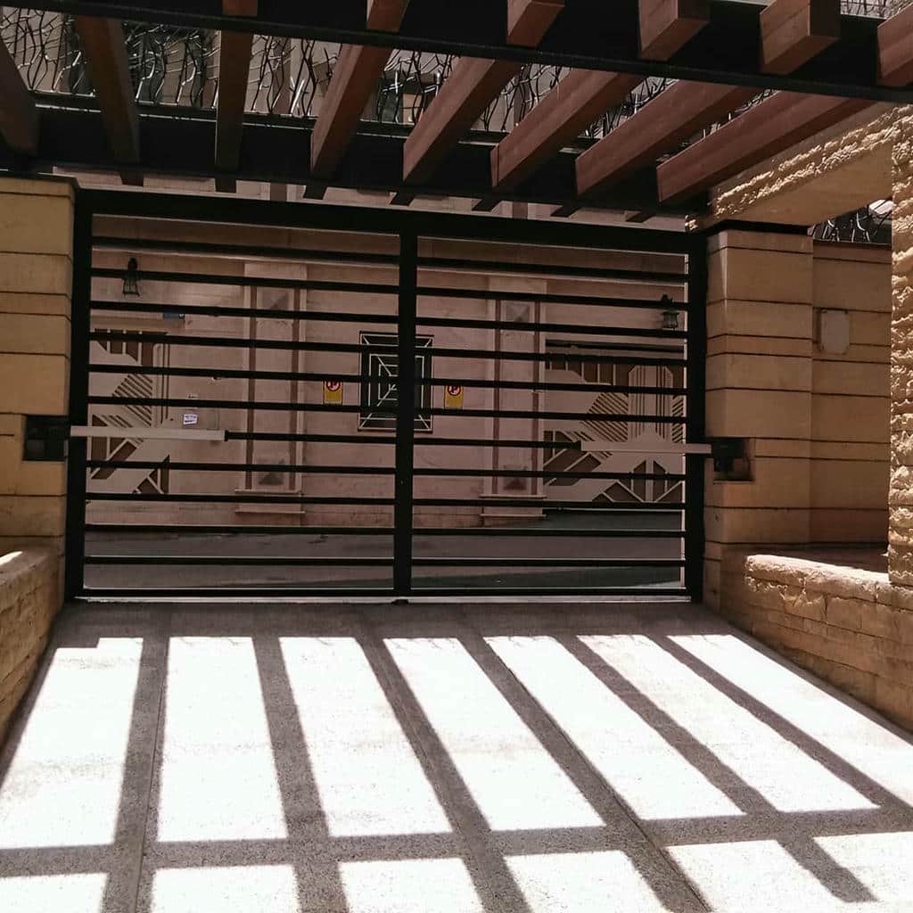 خرید جک درب پارکینگ ویلا بازویی استاندارد در بیرجند