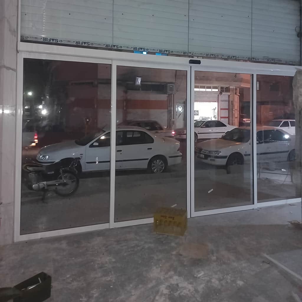 قیمت درب اتوماتیک شیشه ای تک لنگه لولایی