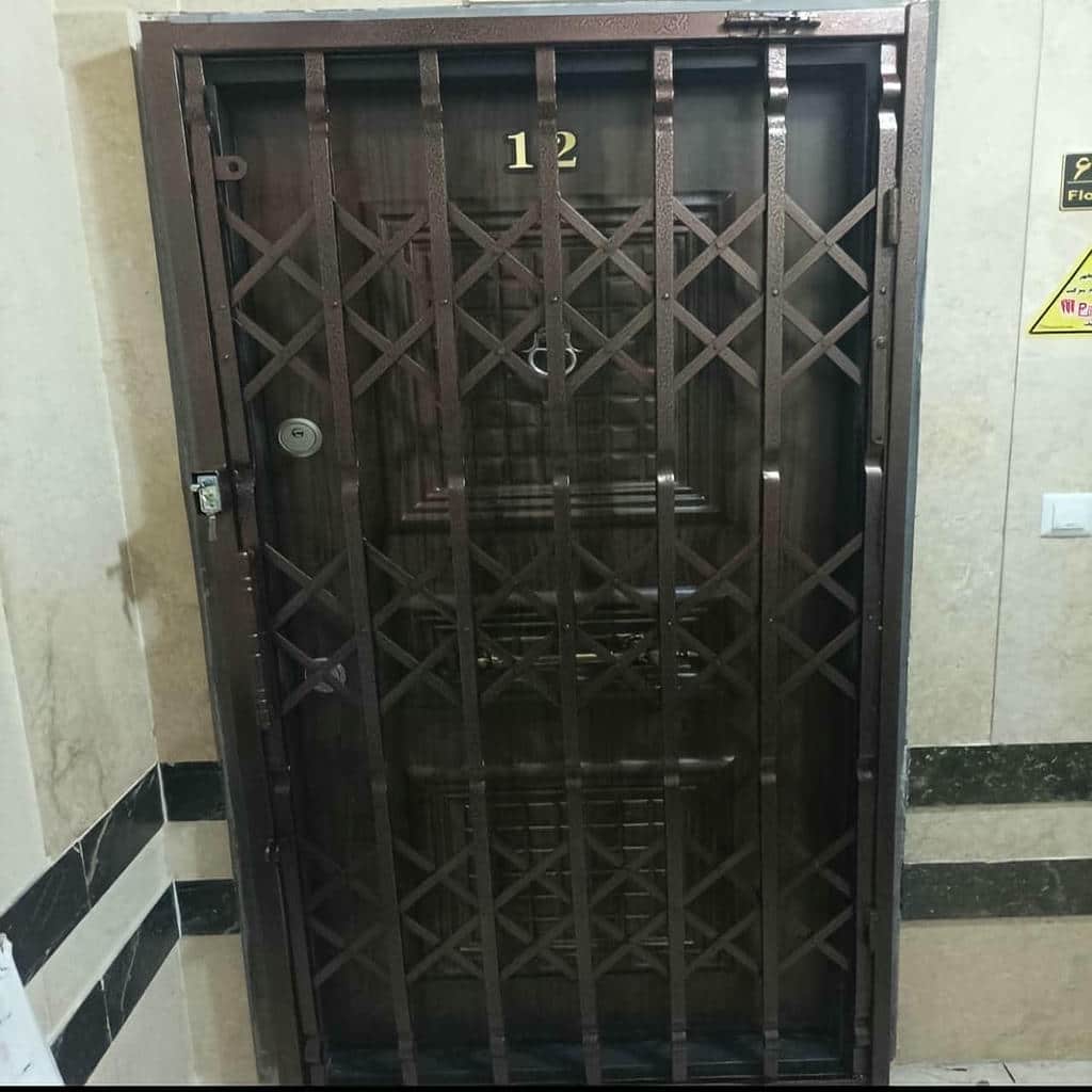 درب آکاردئونی مدل شبکه ای فلزی