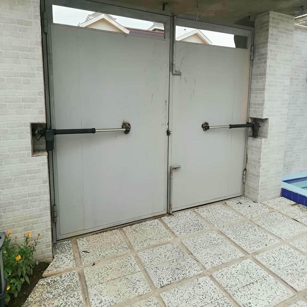 جک درب پارکینگ بازویی روی در فلزی استان کرمان