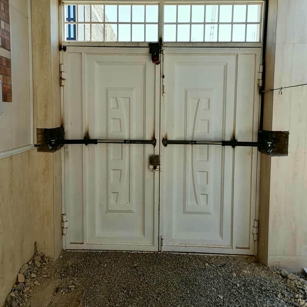 جک درب پارکینگ دو لنگه با بازوهای فلزی