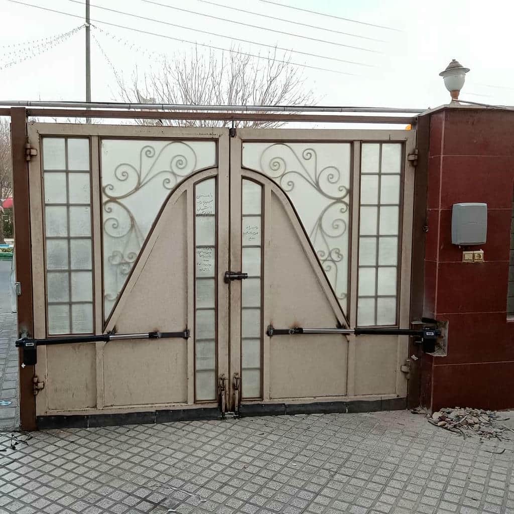 جک درب پارکینگ بازویی برای ورودی مسکونی استان البرز مرکز فروش و سفارش جک درب پارکینگ در استان البرز